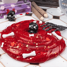 Load image into Gallery viewer, Cute to the Bone Glitter Slime by The Kawaii Slime Company
